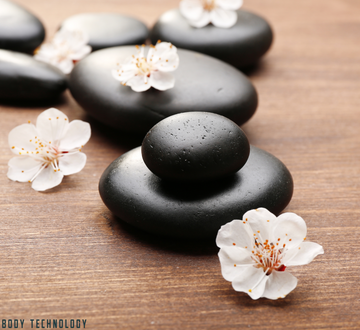 Massage aux pierres chaudes : alternative avec masseurs chauffants